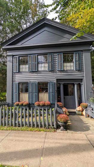 Historic building with a picket fence