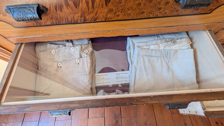 Linen and textile display in a wooden case
